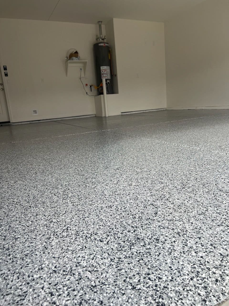 Sleek Epoxy Garage Floor Using Tuxedo Color image