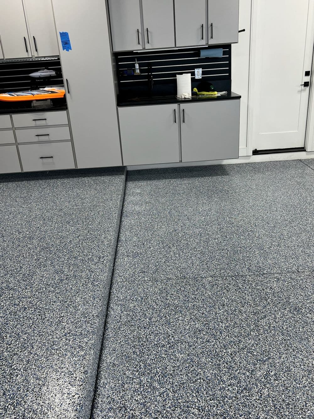Garage Floor Coating and Cabinet Installation