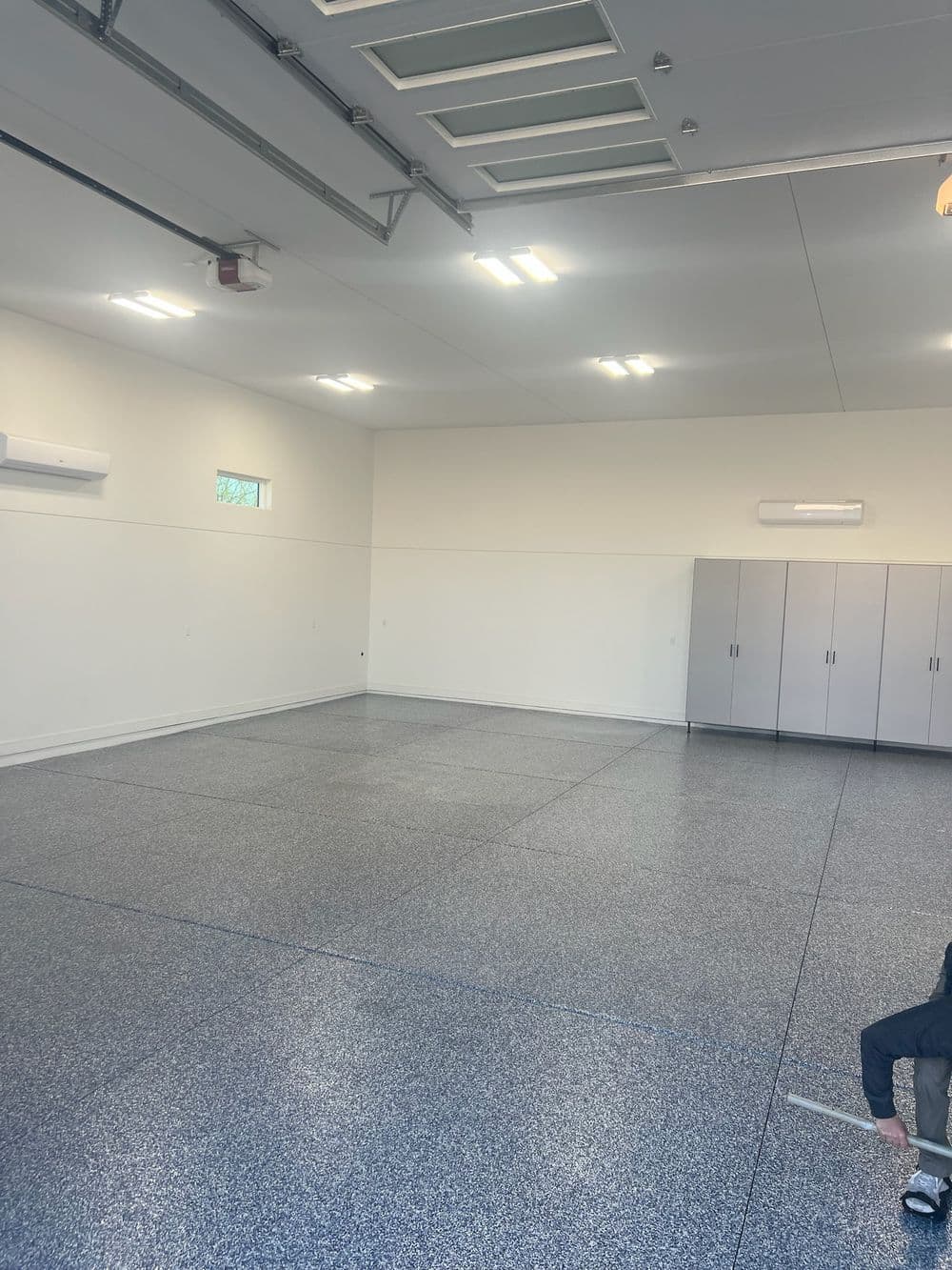 Garage Floor Coating and Cabinet Installation