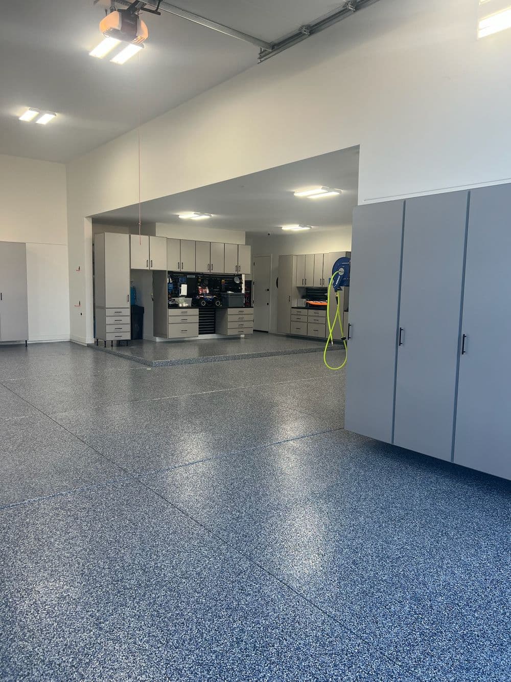 Garage Floor Coating and Cabinet Installation